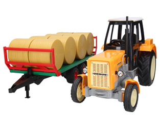 Traktor zabawkowy Ursus C-360 żółty + przyczepa do wywozu balotów Bruder