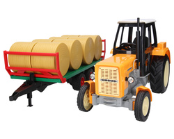 Traktor zabawkowy Ursus C-360 żółty + przyczepa do wywozu balotów Bruder